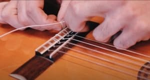 how to string a classical guitar